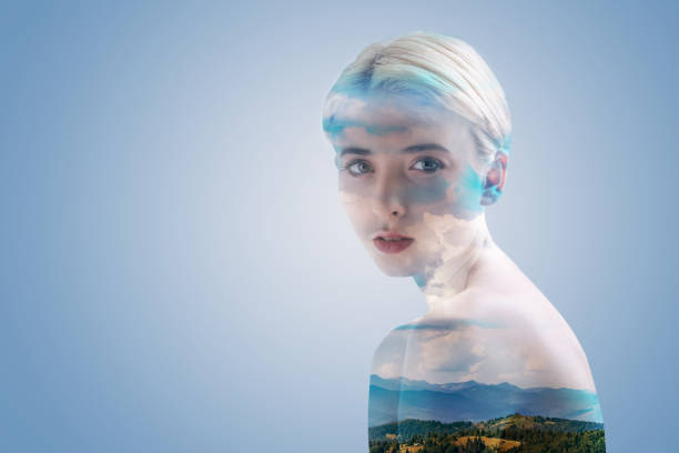 istock Serene millennial girl posing for camera against landscape background 894774568