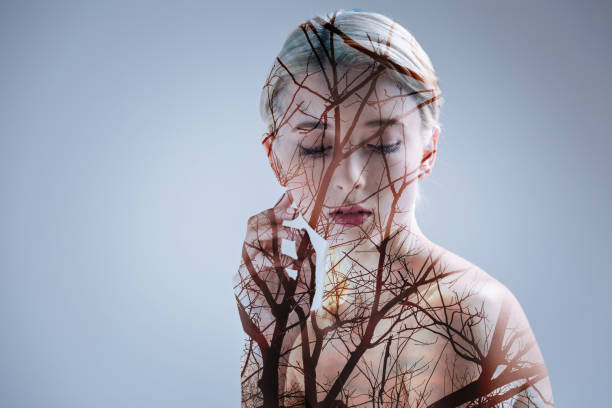 istock Shy thoughtful lady posing against forest background 894776680
