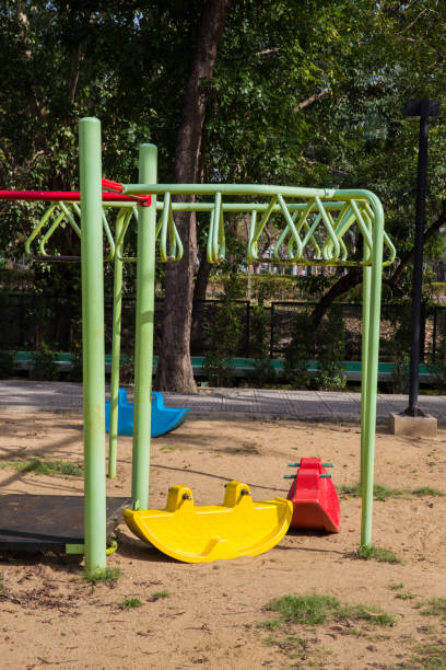 istock Colorful playground in city park 894777176