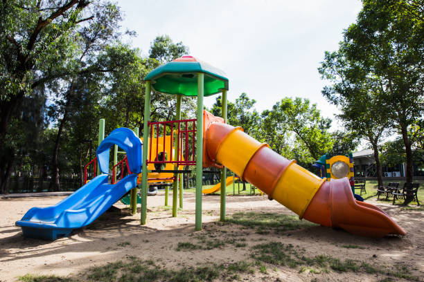 istock Colorful playground in city park 894781432
