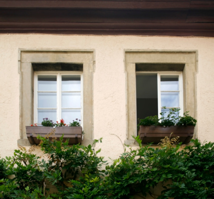 architectural detail of two windows in a small castle in germany