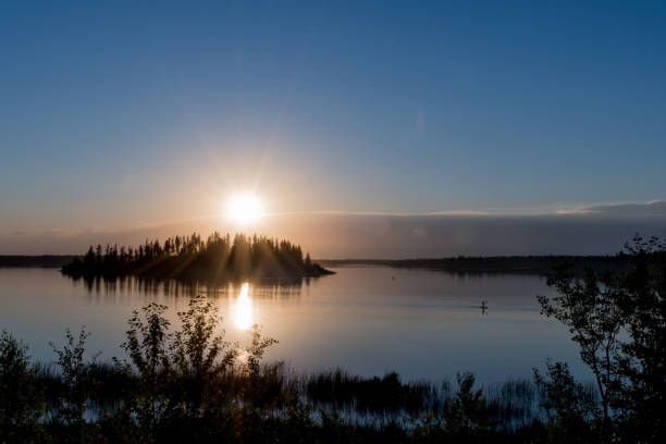 istock Raspberry Island, Astotin Lake, at sunset in Elk Island National Park, Canada 894792186