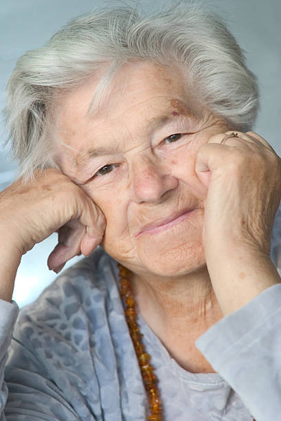 istock Elderly woman leaning on hands 89479465