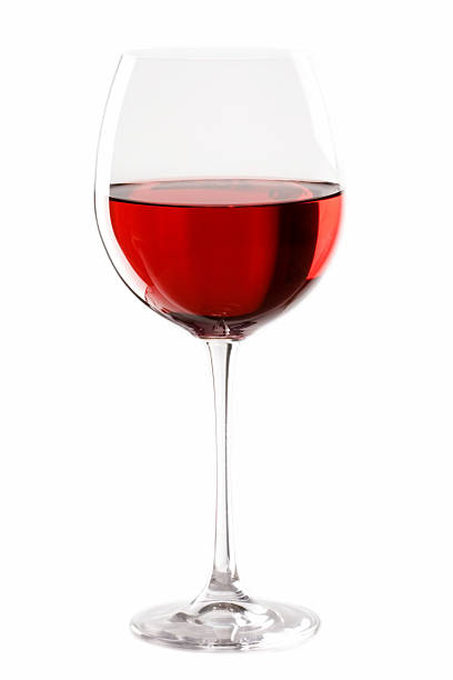 istock Half full wine glass of red wine 89479969