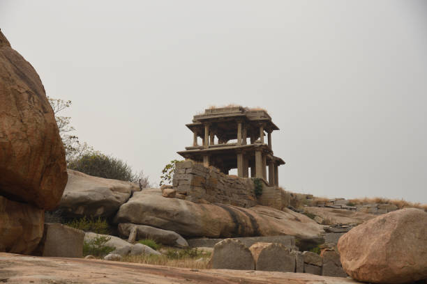 istock Ruins of an ancient temple in Hampi, Karnataka, 894807326