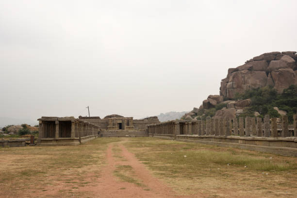istock Ruins of an ancient temple in Hampi, Karnataka, 894807370