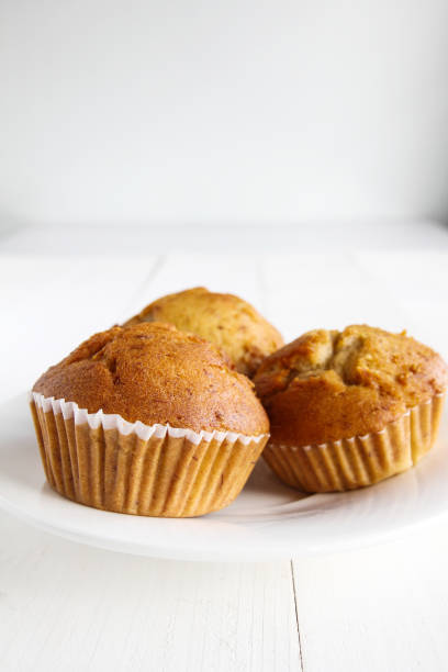istock Banana cakes on wooden table. 894826436