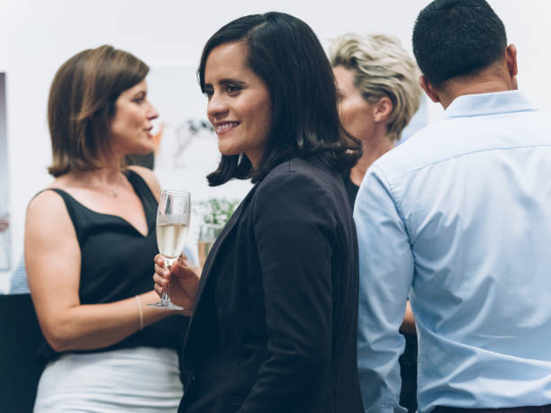 istock business people talking and drinking at bar 894835896