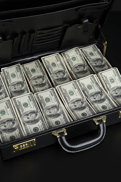 istock Briefcase full of money 89484292