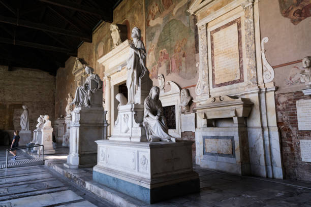 Camposanto Monumental Cemetery, created in the 12th century to be a burial for Pisa's upper class, showcases beautiful art combining ancient Roman sarcophagi and Roman sculptures dating from 3rd century, and fresco paintings dating from the 14th century, Pisa, Italy, Europe