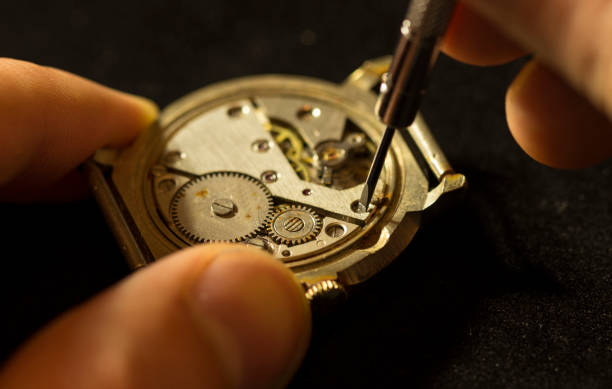 istock Watchmaker is repairing the mechanical watches in his workshop 894857970