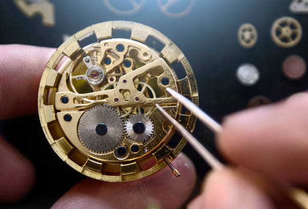 istock Watchmaker is repairing the mechanical watches in his workshop 894858074