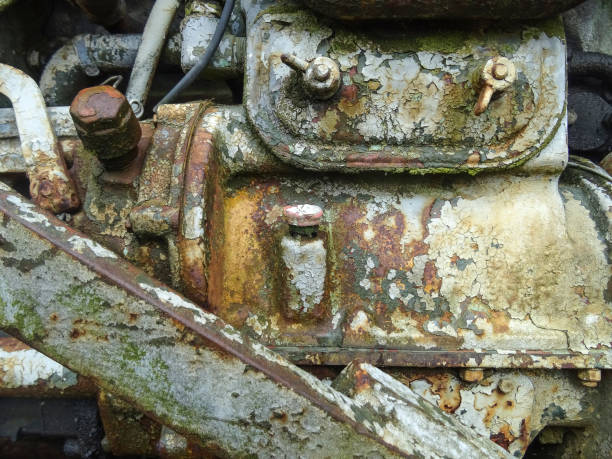 istock Part of an old rusty machine with chipped paint 894864954