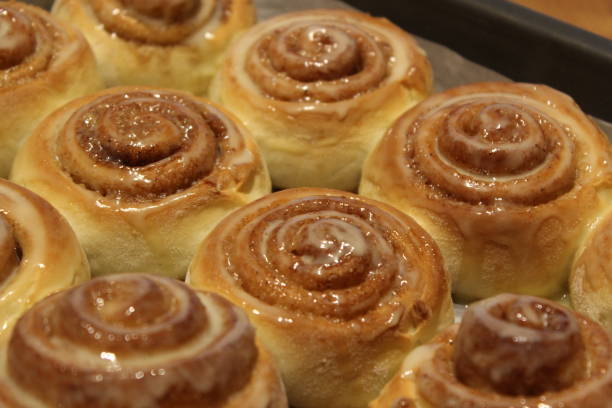 istock Homemade baking. Buns with iced sugar. 894867518