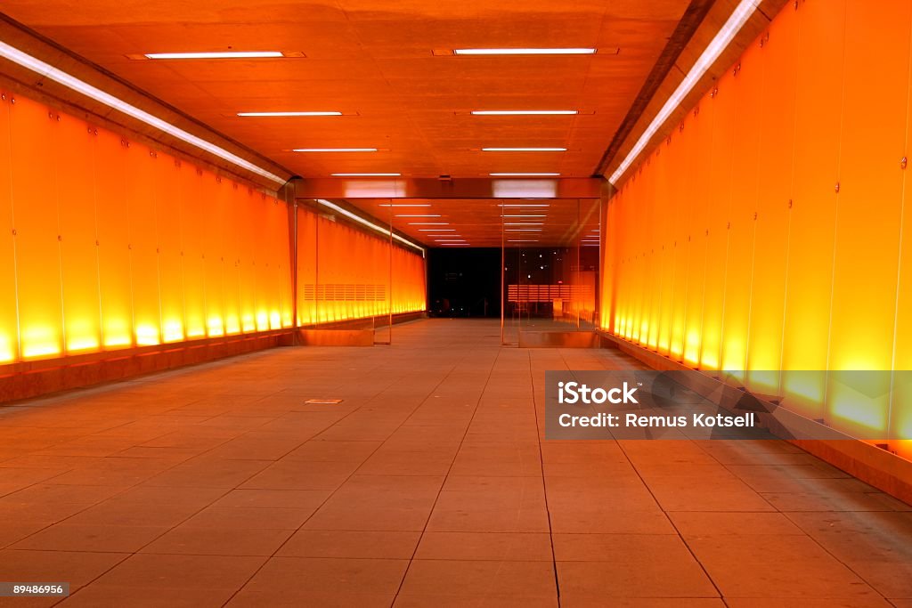 Orange Corridor A hallway from the Stockholm airport. Fluorescent Light Stock Photo