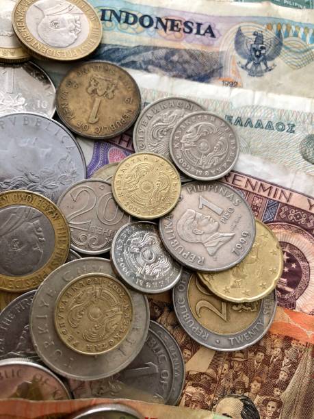 istock Coin and paper money 894880524