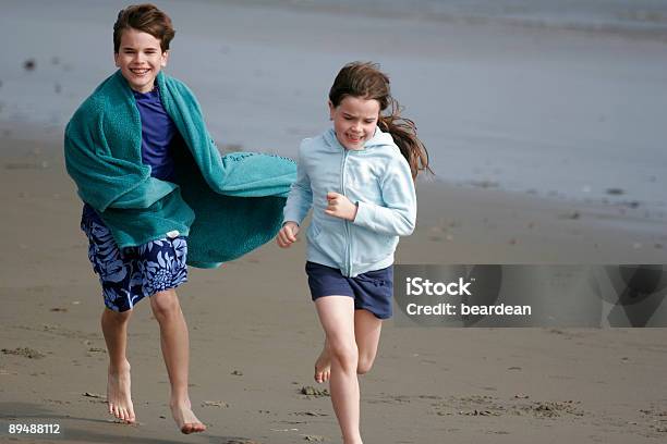 Praia De Execução - Fotografias de stock e mais imagens de Adolescência - Adolescência, Ao Ar Livre, Areia