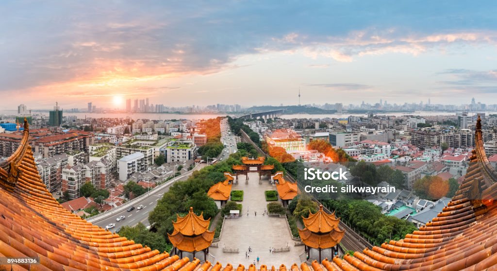 wuhan cityscape in sunset wuhan cityscape in sunset, overlooking from yellow crane tower ,China Wuhan Stock Photo