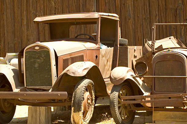These are pictures of very old cars in very good condition, taken at a public exhibition
