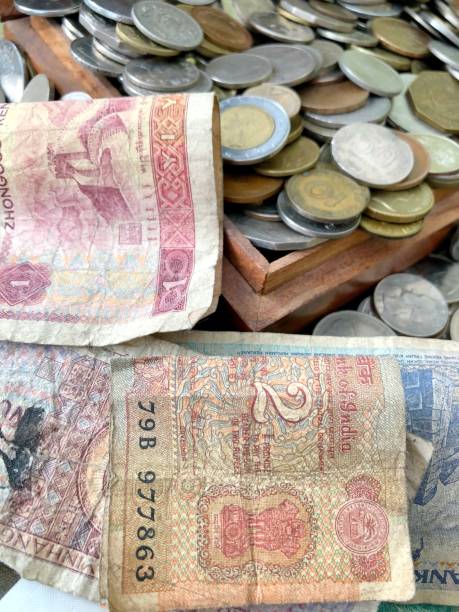 istock Coin and paper money 894897576