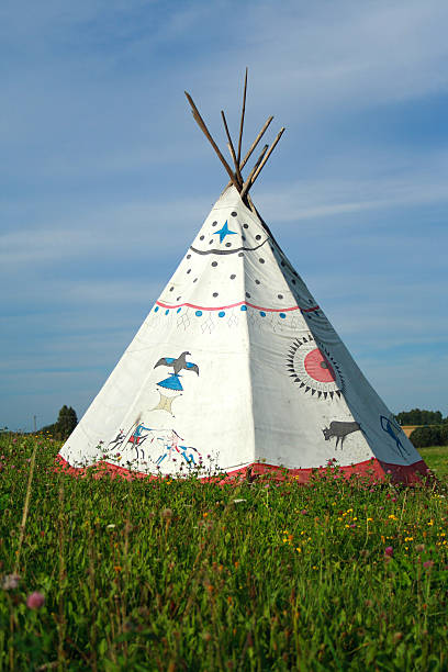 istock White tipi decorated with Native American symbols 89491421