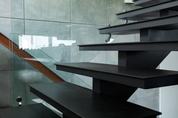 istock staircase in modern villa and cement wall. 894922454