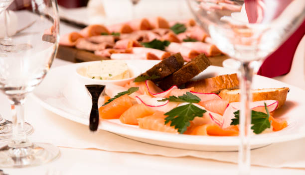 istock Salmon, bread and butter served in a plate 894924524