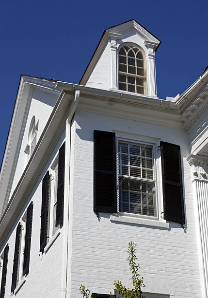 istock White Roof Tops on Blue Sky 89493008