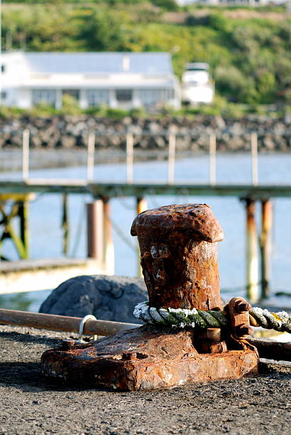 istock Rusty bollard with rope attached, on New Plymouth wharf 89493235