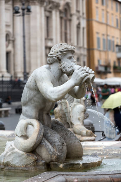 Piazza Navona Fountain of Neptune Fontana del Moro (Moor Fountain) in Piazza Navona. Rome, Italy fontana del moro stock pictures, royalty-free photos & images
