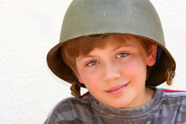 istock Boy in an Army Helmet two 89495709