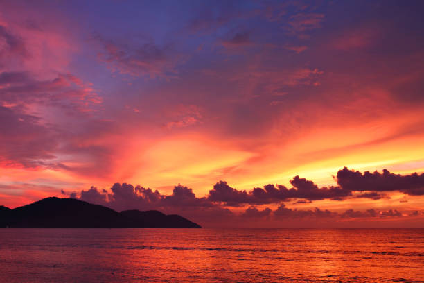 istock Dramatic seascape at sunset in Penang, Malaysia 894962372