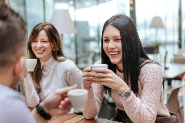 istock Group of friends having coffee together in a restaurant. 894977170