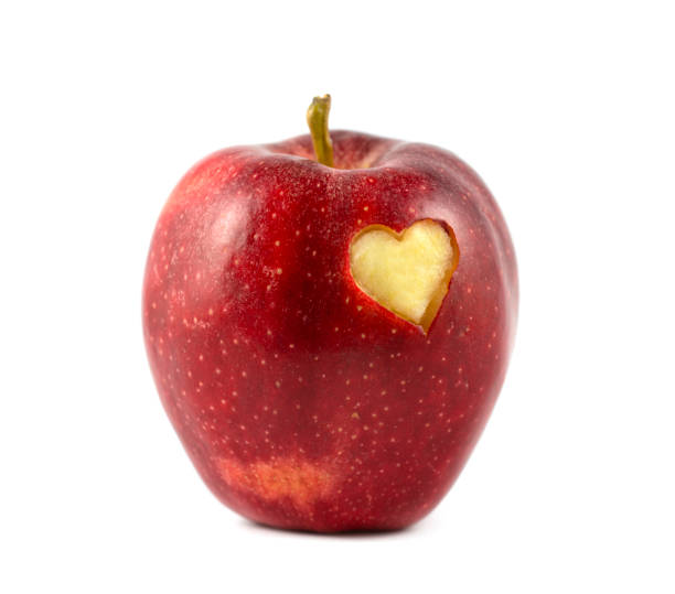 istock Heart shaped bite out of an apple 894977672