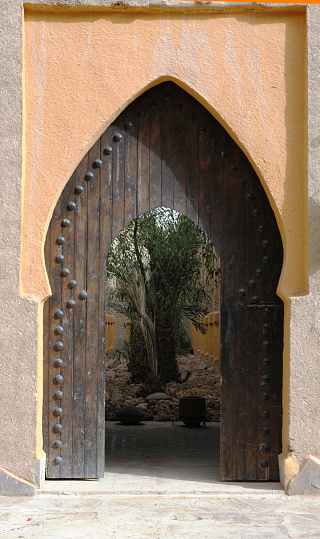 Oaxaca, Oaxaca, Mexico- May 26, 2022: Entrance of a typical house at famous street Los Arquitos at Xochimilco neighborhood in Oaxaca, Mexico