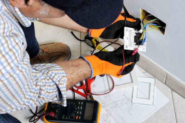 istock Electrician working in a residential electrical system 894986152