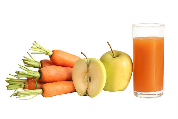 fresh carrot and apple juice stock photo
