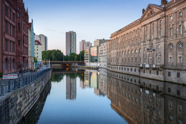 istock Architecture of Berlin reflected in Spree River 894994088