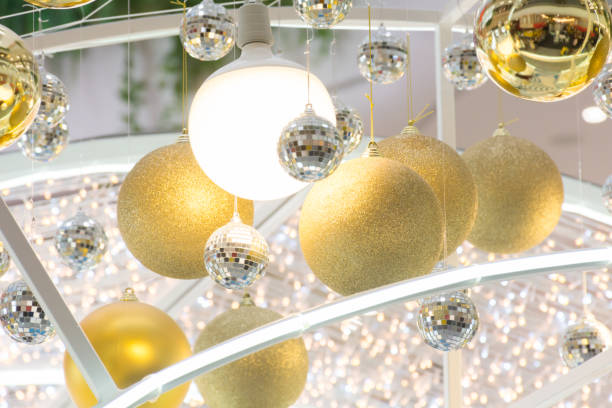 istock Christmas Decorate trees light and golden ball 894994280