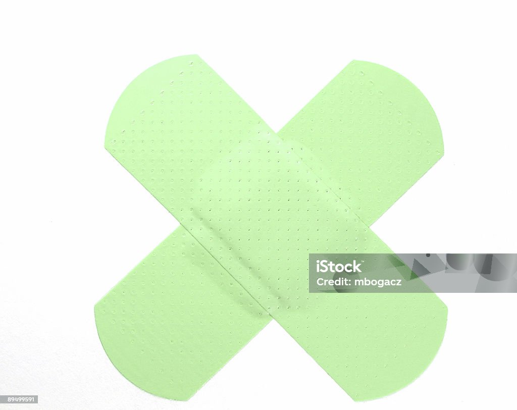 Verde fluo Bandaid - Foto stock royalty-free di Bianco