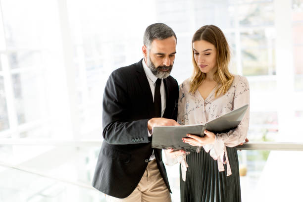 istock Business partners analyze the business results 894997042