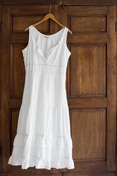 White Dress On Wardrobe  sundress stock pictures, royalty-free photos & images