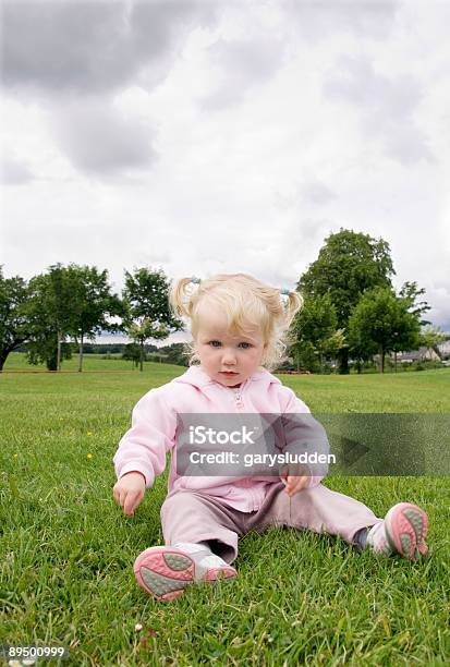 Sitting On Grass Stock Photo - Download Image Now - 18-23 Months, 2-3 Years, Adolescence