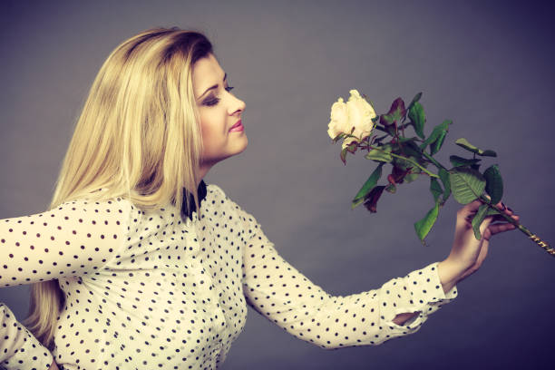 istock Pretty woman with white rose flower 895010014