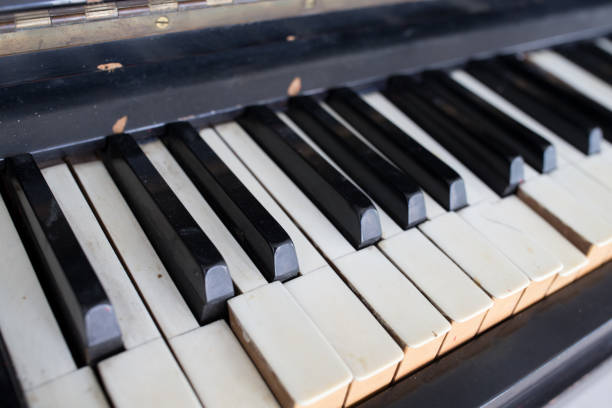 istock an old broken and damaged piano 895014756