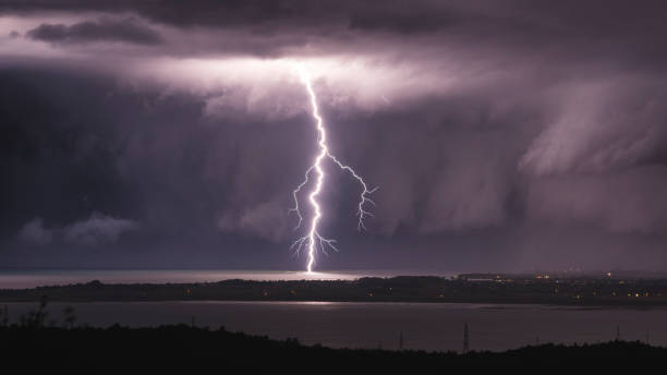 istock Lightning strike illuminates the sea 895015660