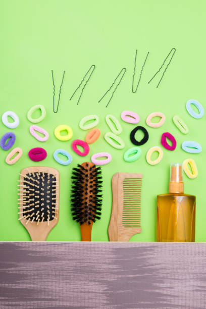 istock set for creating hairstyles and fixing them on a wooden background 895018318