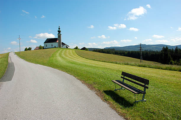 landscape. among the green mountains there is a small church