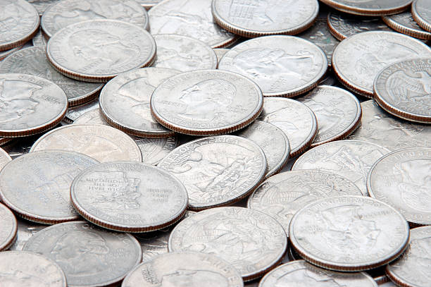 istock Pile of quarters 89502738
