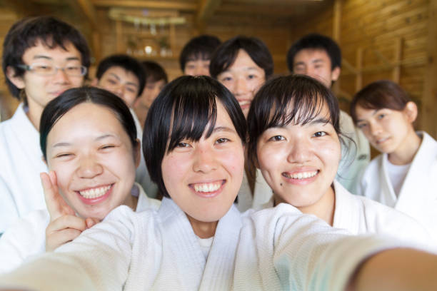 istock Martial Arts People Taking Selfie 895028490